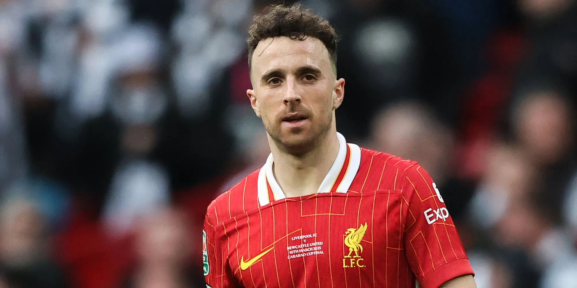 Diogo Jota trong màu áo Liverpool, chuẩn bị quay lại Anh cho mùa giải mới.